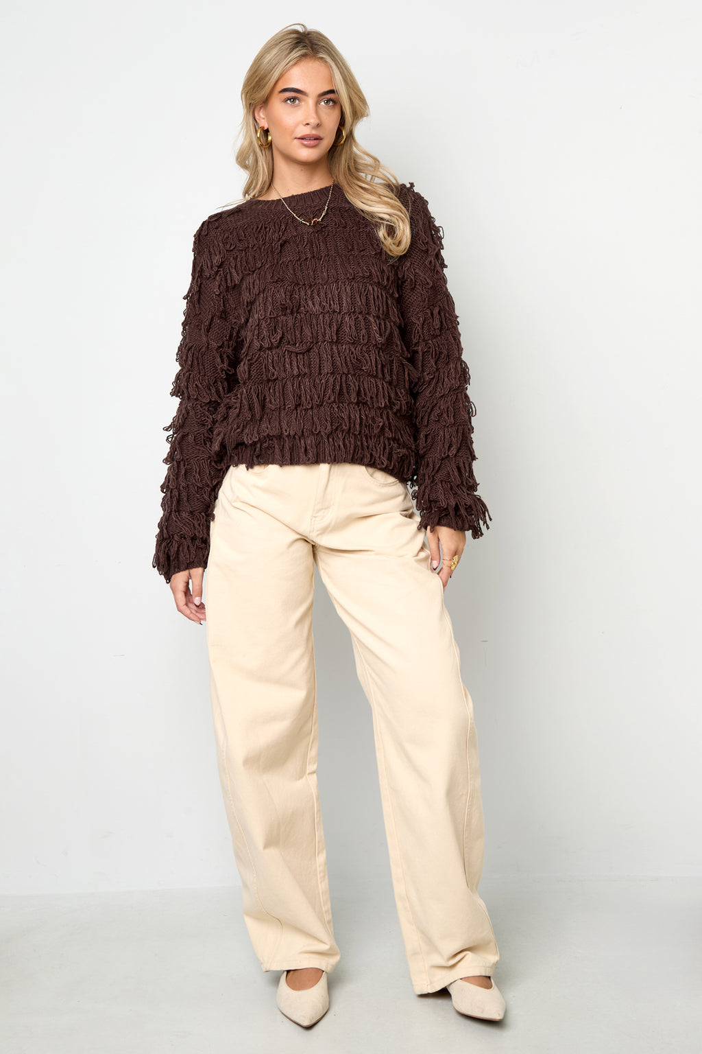 Strickpullover mit Fransen