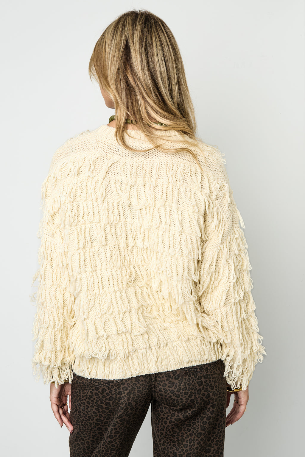 Strickpullover mit Fransen